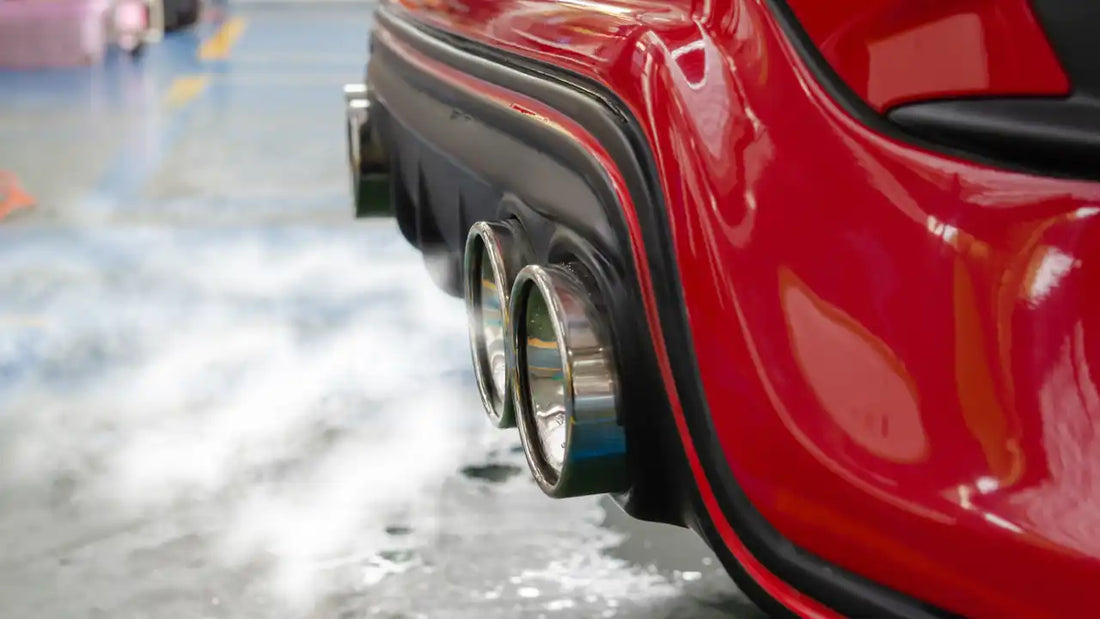 
A sleek, shiny exhaust system displayed.